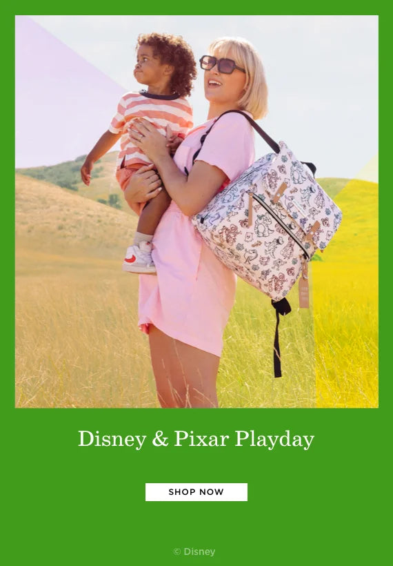 disney & pixar Playday. shop now. by disney. mom wearing the meta backpack in disney & pixar playday while holding toddler boy