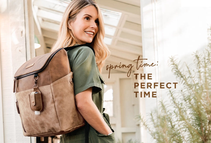 mom wearing the tempo backpack in brioche. spring time: the perfect time