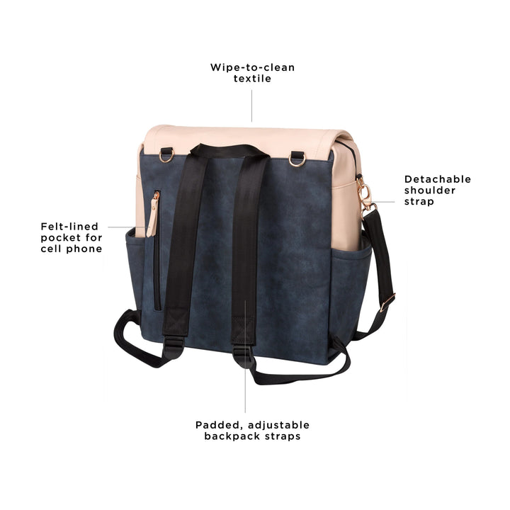 boxy backpack in indigo blush. wipe-to-clean textile. adjustable long strap for crossbody or shoulder carry. felt-lined pocket for cell phone. padded, adjustable backpack straps