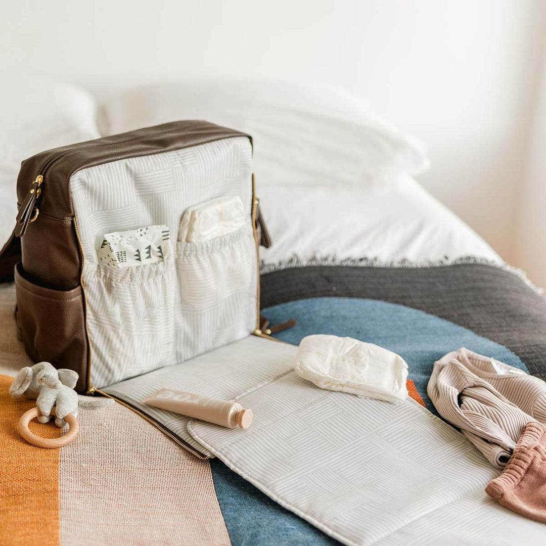 Boxy Backpack in Saddle with diaper changing pad open