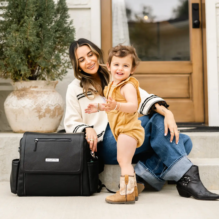 mom wearing boxy backpack deluxe in ebony