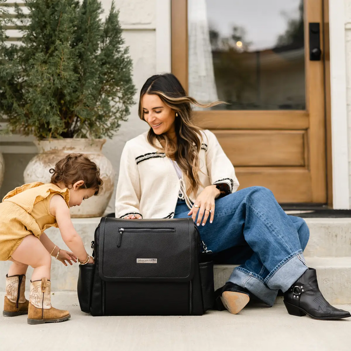 mom wearing boxy backpack deluxe in ebony