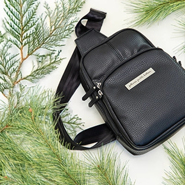 criss-cross sling in ebony with christmas greenery