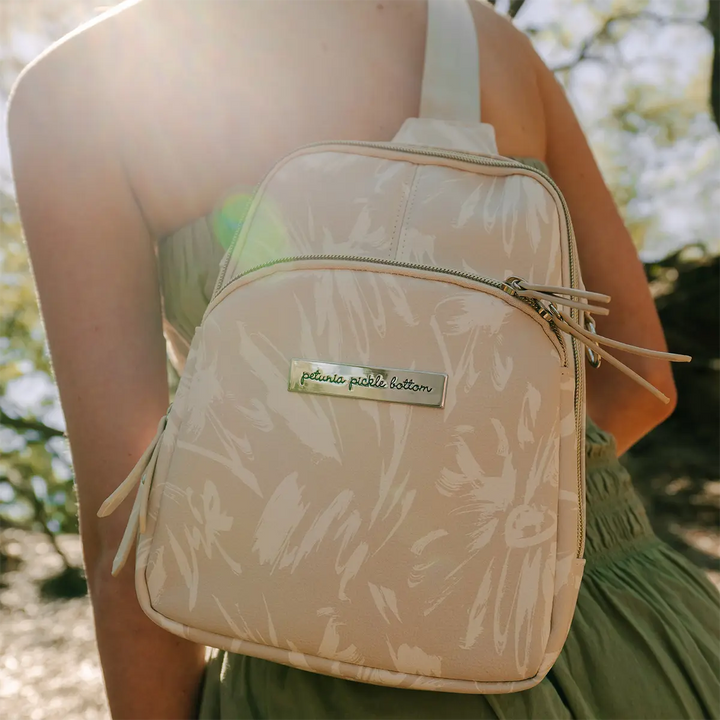 mom wearing the Criss-Cross Sling in Linen Blossom