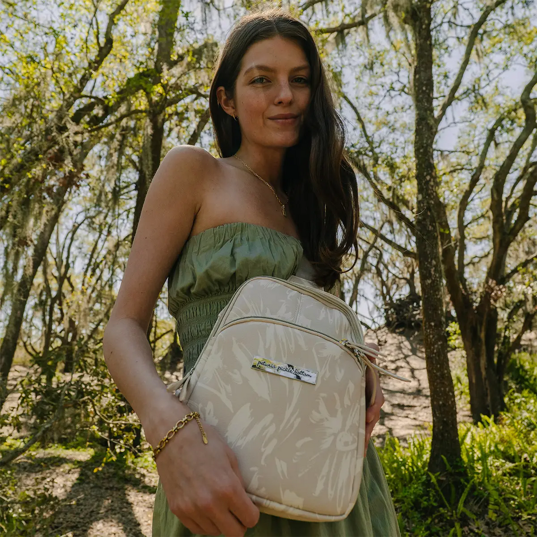 mom wearing the Criss-Cross Sling in Linen Blossom