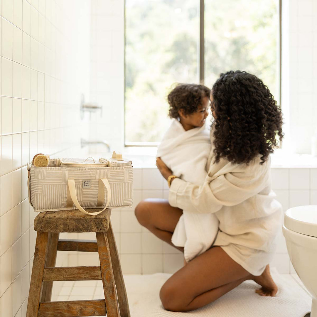 Deluxe kit used as bathroom caddy at bathtime to organize shampoo, brushes and toys