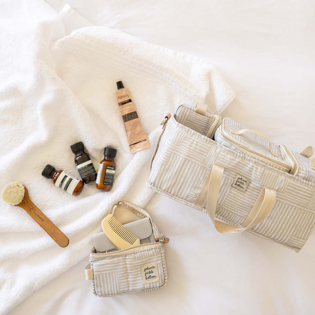 Deluxe kit shown with personal care items for travel to hotels & resorts