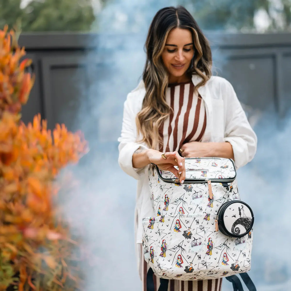 mom holding the Method Backpack in Disney's Halloween Town