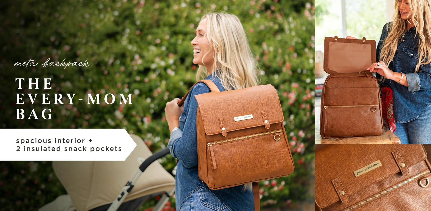 meta backpack. the every-mom bag. spacious interior + 2 insulated snack pockets. mom wearing the meta backpack in cedar