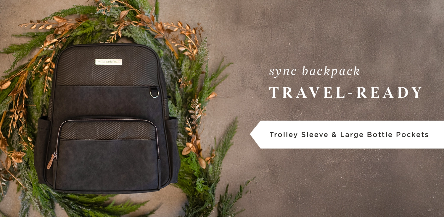 sync backpack in carbon cable featuring trolley sleeve and large bottle pockets