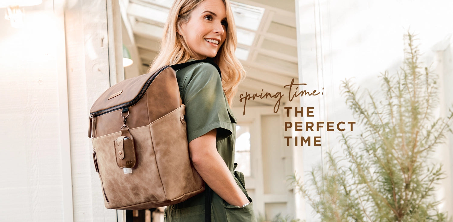 mom wearing the tempo backpack in brioche. spring time: the perfect time