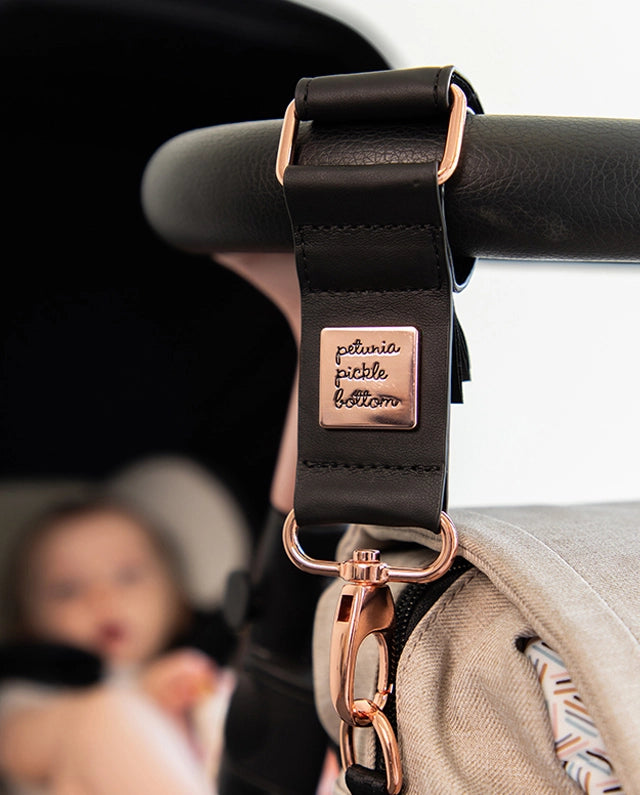 Universal valet stroller clips for hanging diaper bags & accessories from the handlebar of a stroller