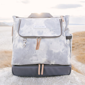select diaper bags and accessories on sale for limited time while supplies last featuring pivot pack diaper bag backpack in smoke swirl tie dye