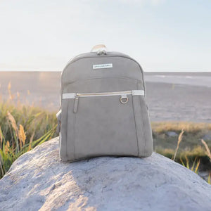 2-in-1 provisions diaper bag backpack and breast pump bag shown in grey matte leatherette