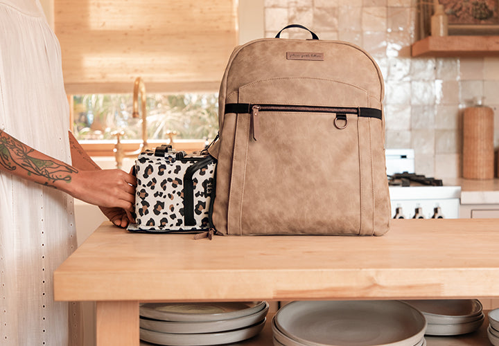 gifts for the ultra organizer featuring petunia deluxe kit organizing caddy including packing cubes shown in leopard print