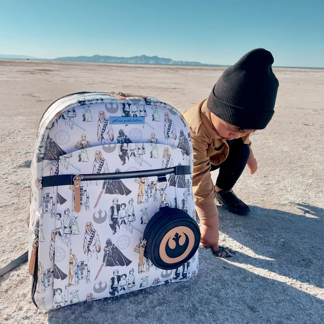 kid playing behind the the provisions backpack in the star wars collection