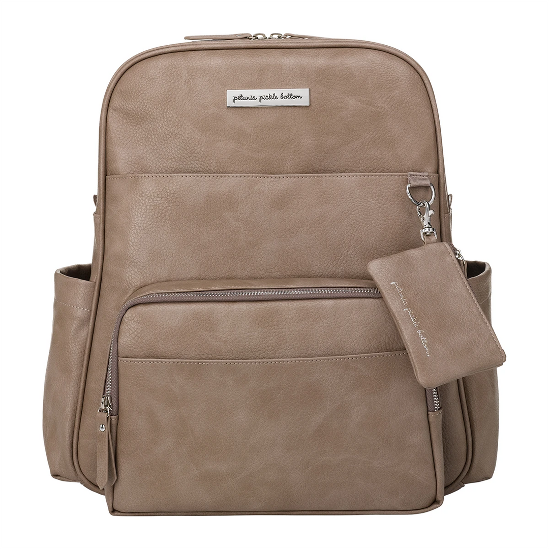 Sync Backpack in Mink. Mink color is cool-toned greige with shiny silver hardware.