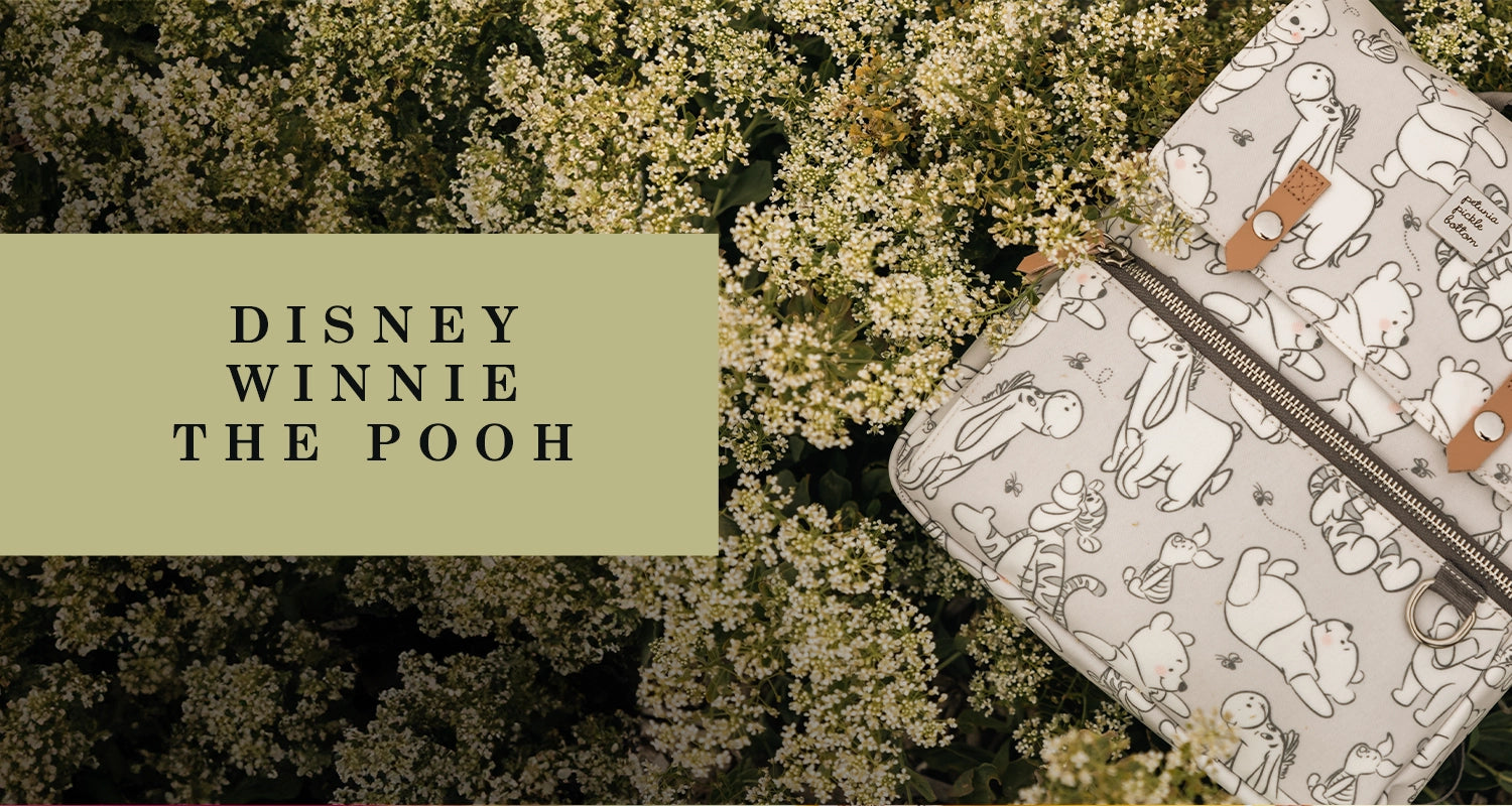disney winnie the pooh. featuring the mini meta backpack in playful pooh