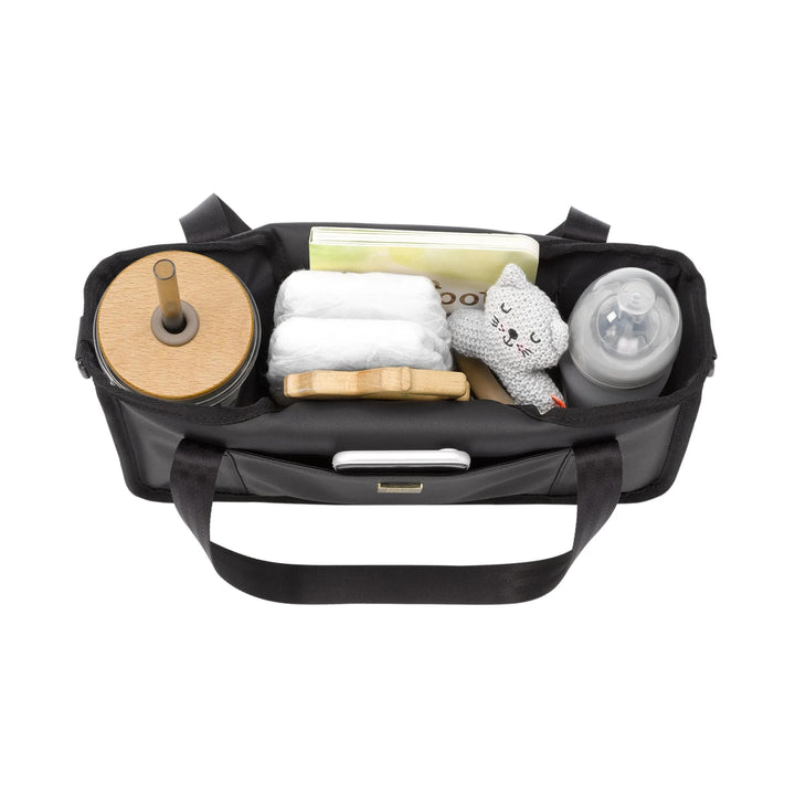wander stroller caddy in black matte leatherette with props inside