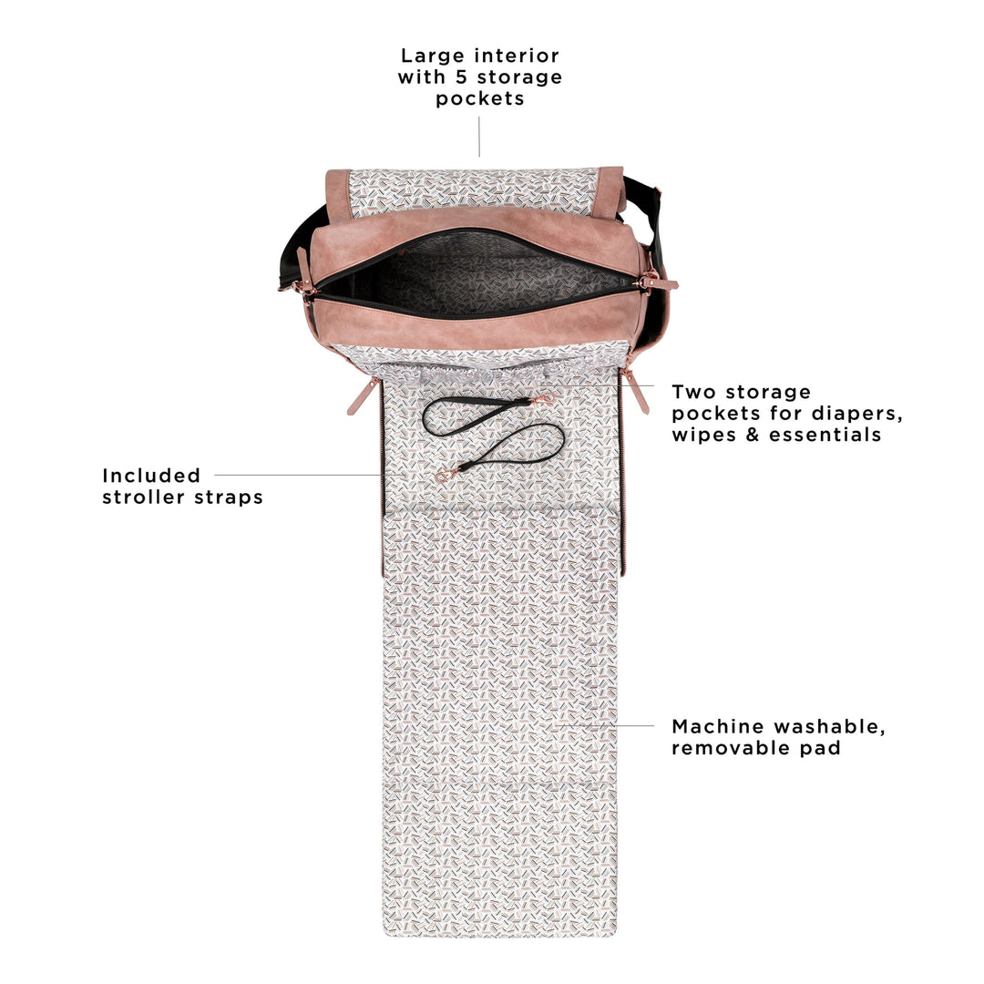 boxy backpack in dusty rose with front flap and diaper changing pad open. large interior with 6 storage pockets. included stroller straps. two storage pockets for diapers, wipes and essentials. machine washable, removable pad