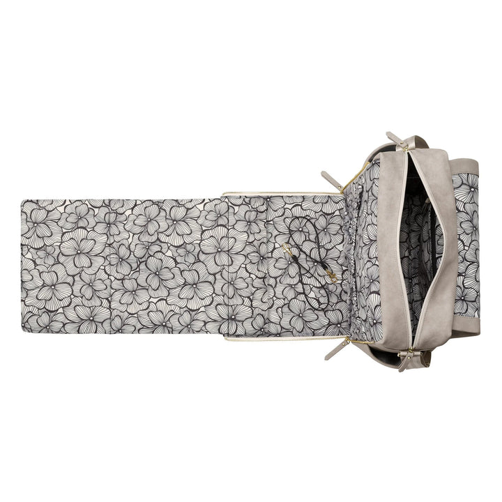 boxy backpack in grey matte leatherette with changing pad open