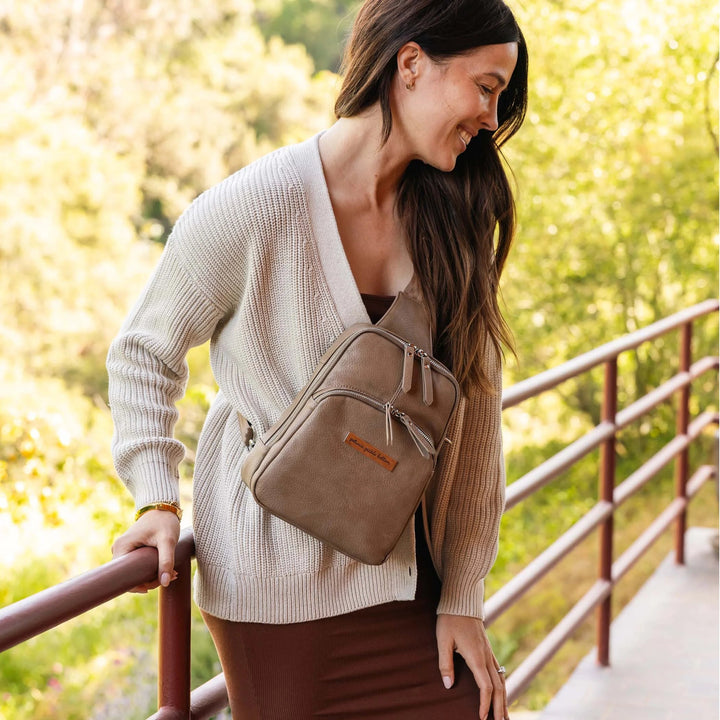 mom wearing the Criss-Cross Sling in Mink