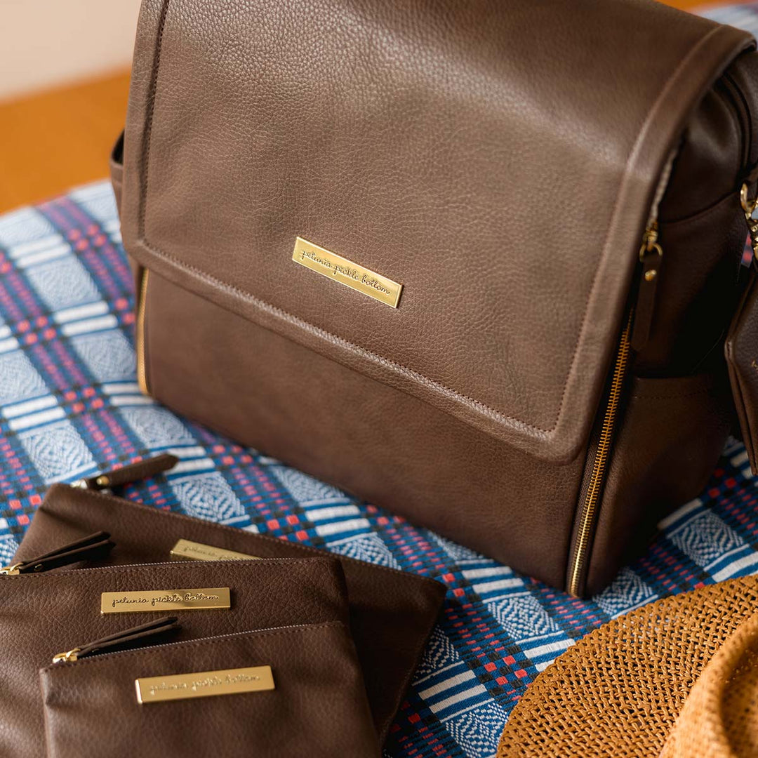 boxy backpack and organizer trio in saddle