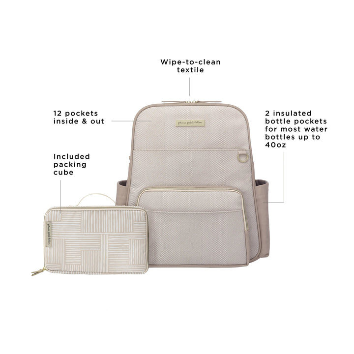 Sync Backpack features wipe-to-clean textile, 12 pockets inside and out, 2 insulated bottle pockets for water bottles up to 40oz, included packing cube